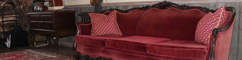 Reading nook with antique red couch