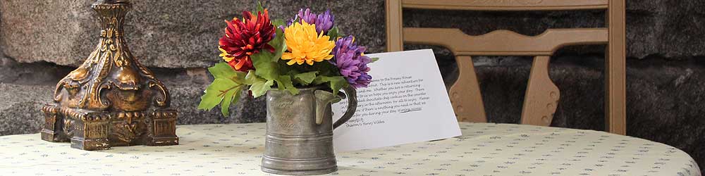 Breakfast table set with fresh flowers